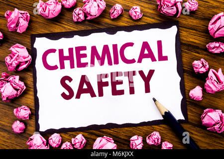 Hand writing text caption inspiration showing Chemical Safety. Business concept for Hazard Health At Work Written on sticky note paper, wooden backgro Stock Photo