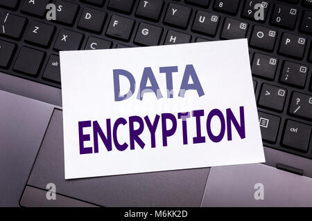Hand writing text caption inspiration showing Data Encryption. Business concept for Information Security written on sticky note paper on black keyboar Stock Photo