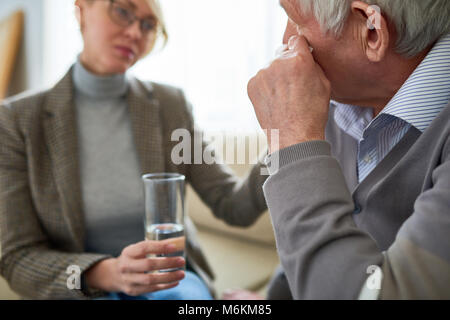 Crying Senior Man in Therapy Stock Photo