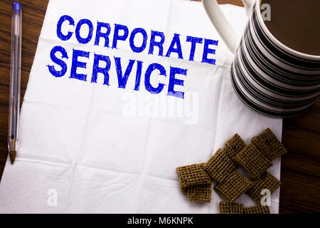 Hand writing text caption showing Corporate Service. Business concept for Csr Digital Content written on tissue paper on wooden background with pen an Stock Photo