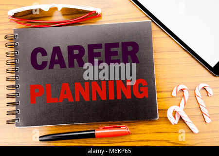 Handwriting Announcement text   Career Planning. Business concept for Job Goal Success Written on notepad notebook book wooden background in office vi Stock Photo