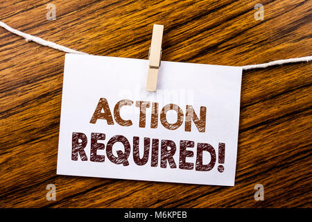 Handwriting Announcement text showing Action Required. Business concept for Immediate Urgent written on sticky note paper on wooden background. Stock Photo