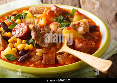 National dish Cape Verde - Cachupa stew with meat and vegetables close-up in a plate. horizontal Stock Photo