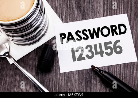 Handwriting Announcement text showing Password 123456. Business concept for Security Internet written on sticky note paper on wooden wood background.  Stock Photo