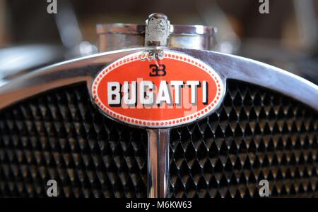 Bugatti radiator and trademark are exhibited at the car collection of the museum Cité de l'Automobile in Mulhouse. | usage worldwide Stock Photo