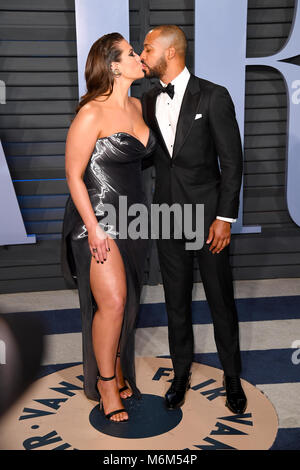 Justin Ervin and Ashley Graham arriving at the Vanity Fair Oscar Party held in Beverly Hills, Los Angeles, USA. Stock Photo