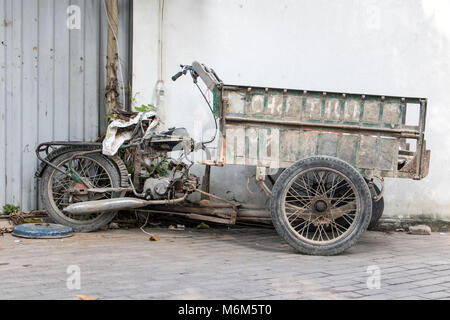 Old rusted abandoned motorcycle in desolate barn Stock Photo - Alamy