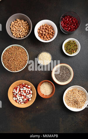 Superfoods in small bowls, food above Stock Photo