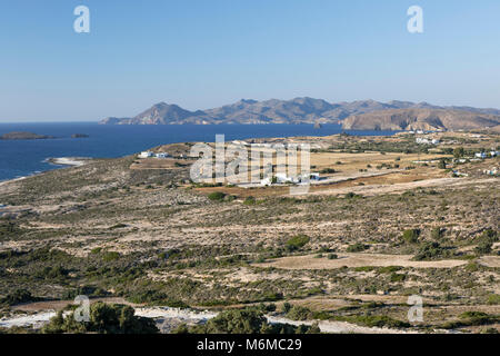 View along north coast of island with Kimolos behind, near Mytakas, Milos, Cyclades, Aegean Sea, Greek Islands; Greece; Europe Stock Photo