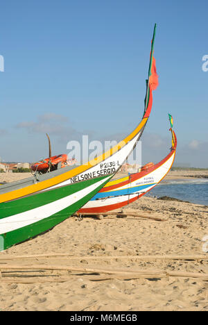 Typical old portuguese fishing boats on the beach of Espinho, Portugal Stock Photo