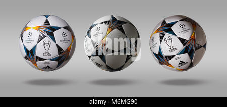 Kiev, Ukraine - February 22, 2018: Three turn the side Adidas official UEFA Champions League ball on a gray background Stock Photo