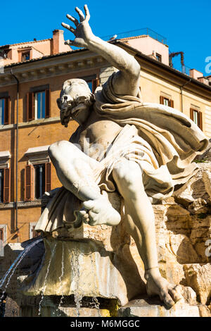 Statue Rio de la Plata  (silver river) from Fontana dei Quattro Fiumi (Fountain of the Four Rivers) by Lorenzo Bernini on Piazza Navona, Rome, Italy. Stock Photo