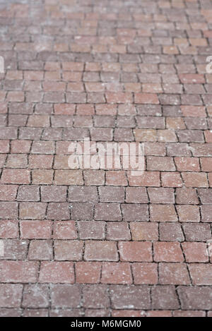 sett, red  paving background texture selective focus Stock Photo