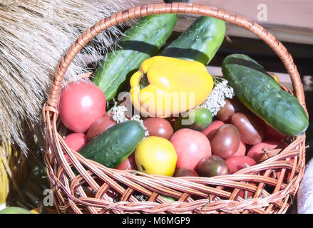 Wicker basket with vegetables. Stock Photo
