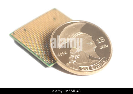 Central processing unit CPU microchip with Golden Bitcoin isolated Stock Photo