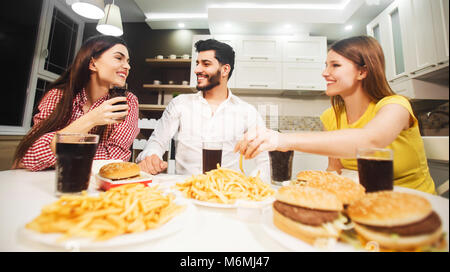 Guys Having Talk at Dinner Stock Photo