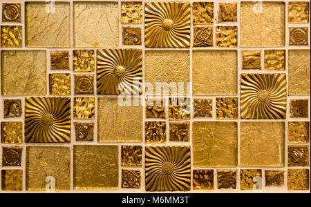 Shiny golden mosaic background of seamless full frame tles Stock Photo