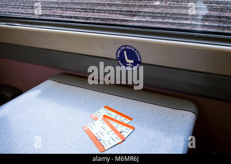 Train travel. Railway tickets on the table of a UK railway carriage Stock Photo