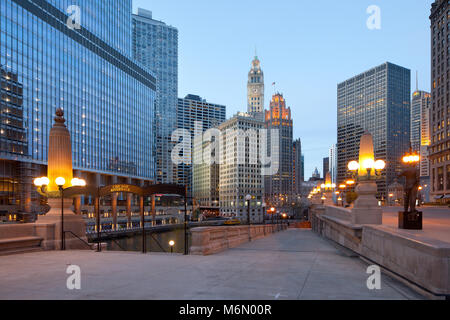 Chicago, Illinois, United States - A view of Chicago River, riverwalk and office buildings at downtown. Stock Photo