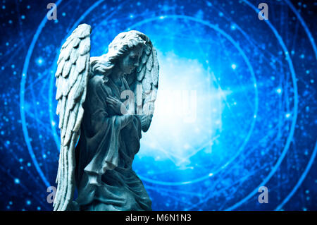 angel statue praying Stock Photo