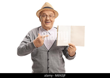 Mature man holding a blank notebook and pointing isolated on white background Stock Photo