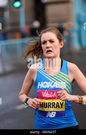 Rebecca Murray running in the Vitality Big Half marathon crossing Tower Bridge, London, UK Stock Photo