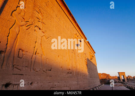 Reliefs of Cleopatra VII and Caesarion, her son with Julius Caesar, int the Temple of Hathor in Dendera, Egypt Stock Photo