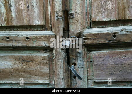 Padlock on old wood door in Turkey Stock Photo