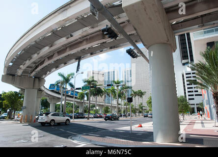 Biscayne Boulevard in Miami downtown with monorail free transportation above (Florida). Stock Photo