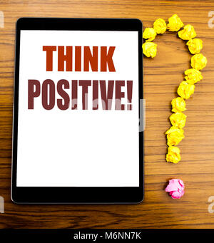 Handwriting Announcement text showing Think Positive. Business concept for Positivity Attitude Written on tablet wooden background in the office table Stock Photo