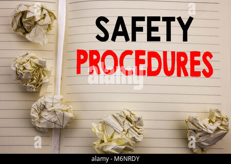 Handwritten text showing Safety Procedures. Business concept writing for Accident Risk Policy Written on notepad paper, white background with space an Stock Photo