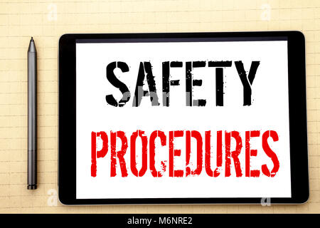 Handwritten text showing Safety Procedures. Business concept writing for Accident Risk Policy Written on tablet computer screen, white background offi Stock Photo
