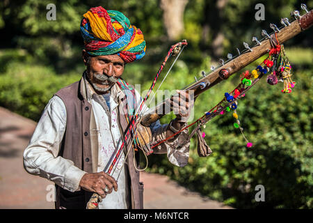 INDIA RAJASTHAN Mandore Garden. Musician playing a traditional ...
