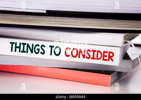 Word, writing Things To Consider. Business concept for Business Knowledge written on the book the white background. Stock Photo