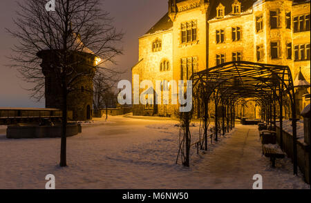 Castle Wernigerode in winter with snow during dawn. Stock Photo