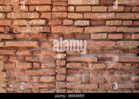 Weathered old brick wall background. Stock Photo