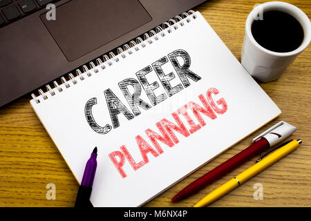 Writing text showing Career Planning. Business concept for Job Goal Success written on notebook book on wooden background in the Office with laptop Stock Photo