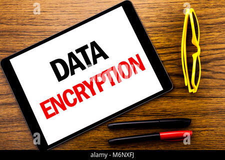 Writing text showing Data Encryption. Business concept for Information Security Written tablet laptop, wooden background with vacation yellow glasses  Stock Photo