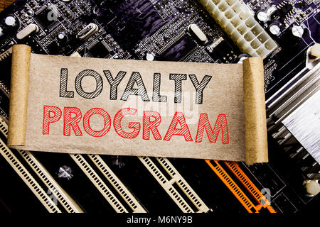 Writing text showing Loyalty Program. Business concept for Marketing Concept Written on sticky, computer main board background. Stock Photo