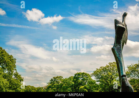 Sir Henry Moore's bronze sculpture Large Standing Figure Knife Edge in Greenwich Park London UK Stock Photo