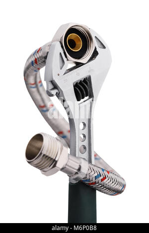 Adjustable wrench with flexible hose isolated on white background Stock Photo