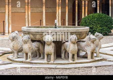 Granada, Andalusia, Spain - February 5th, 2006 : Fountain of the Court of the Lions (Patio de los Leones) in the Alhambra palace and fortress complex. Stock Photo