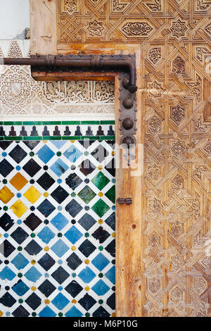 Granada, Andalusia, Spain - April 9th, 2006 : Geometrical woodwork and tiling in the Court of the Myrtles (Patio de los Arrayanes) of the Comares Pala Stock Photo