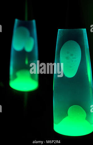 Lava lamp in darkness. Abstract isolated composition Stock Photo