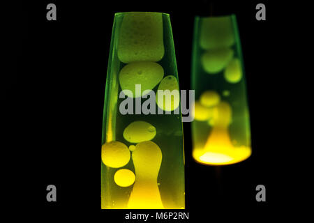 Lava lamp in darkness. Abstract isolated composition Stock Photo
