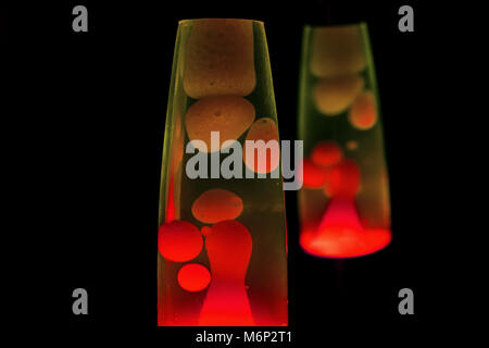 Lava lamp in darkness. Abstract isolated composition Stock Photo