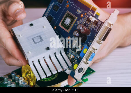 Mining crypto currency. Close-up and selective focus a graphic card of computer working for bitcoin mining and mining crypto currency. Bitcoin mining  Stock Photo