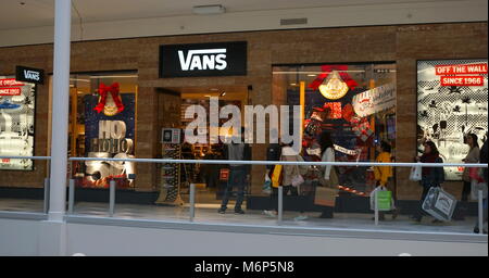 Minneapolis Minnesota - November 2016: Vans sneaker shoe store retail location in Mall of America on black Friday. Shoppers purchase latest fashion fo Stock Photo