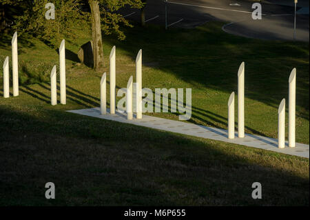 The royal seat of first kings of Denmark with large stone ship, two large burial mounds, the Jelling stones of Viking Age and Romanesque Jelling Churc Stock Photo