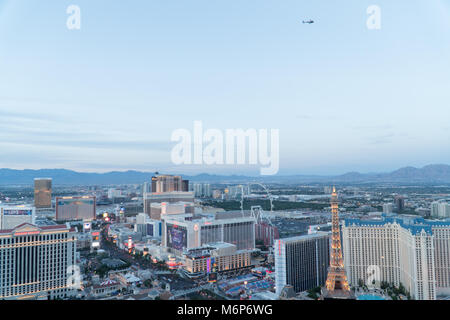 Las Vegas, USA - Circa 2017: Aerial view of Las Vegas hotel casino strip skyline. Helicopter tour city taking photographs circles high above the city 